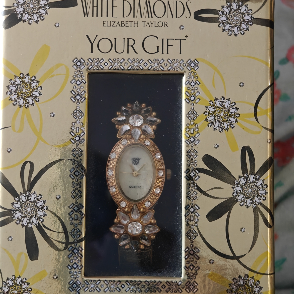 Elizabeth Taylor White Diamonds Women's Gold Watch GWP